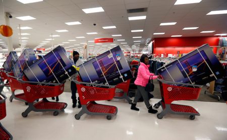 Thanksgiving Day holiday shoppers line up with television sets on discount at the Target retail store in Chicago